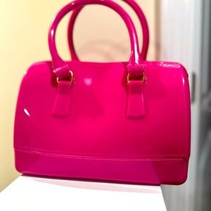 Unbranded hot pink mini duffle style bag